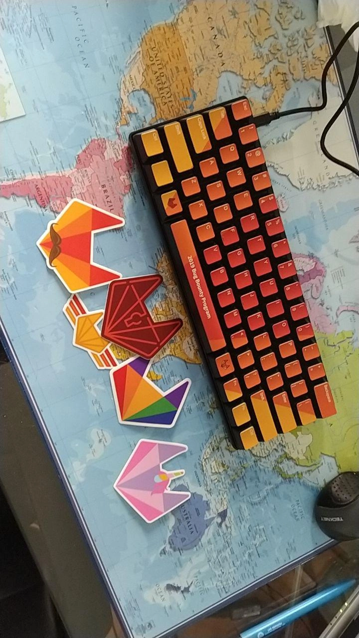 A GitLab branded mechanical keyboard